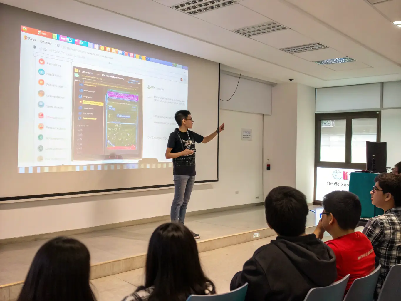 An image of a student presenting their coding project with confidence, highlighting presentation and communication skills.